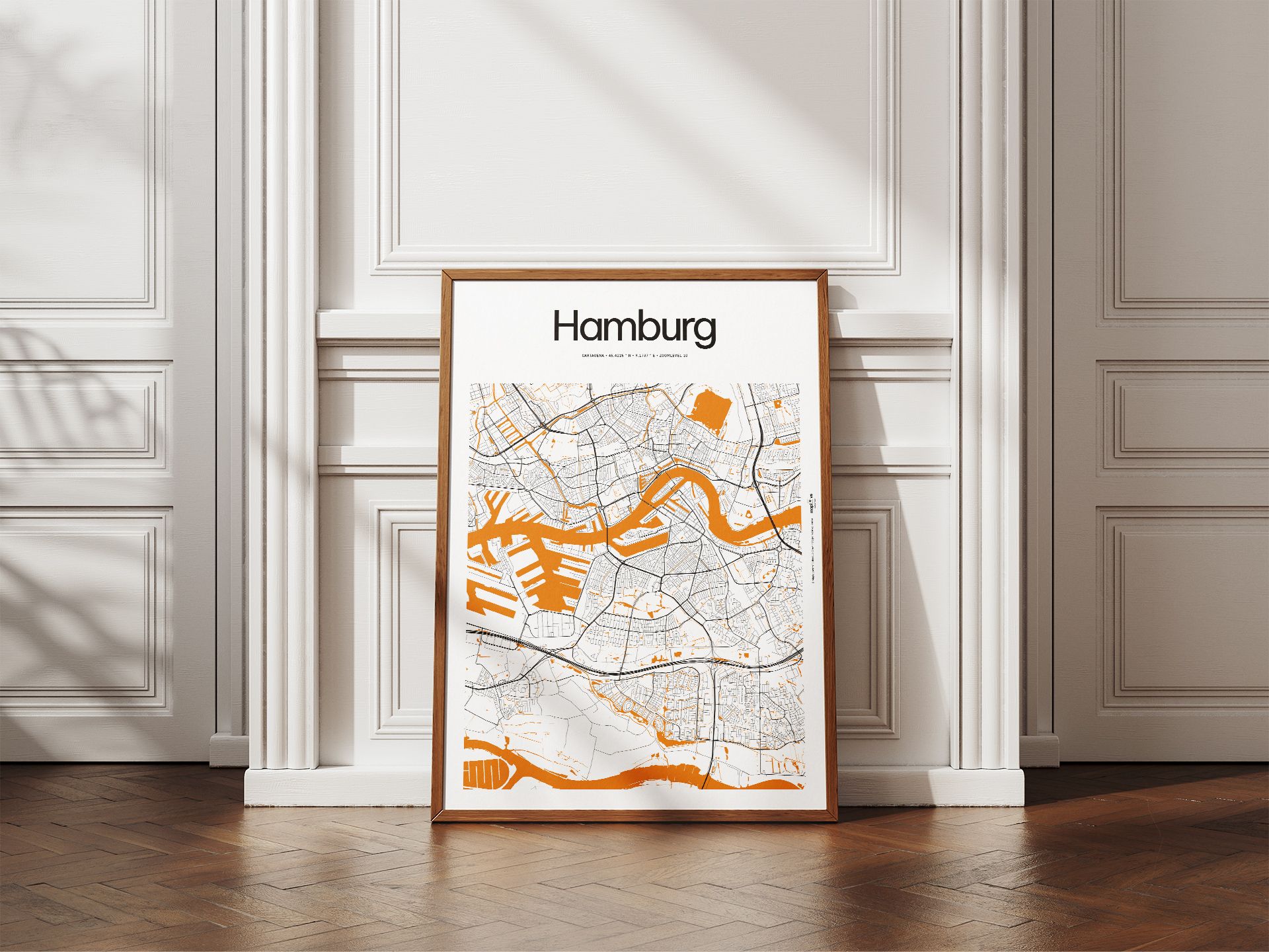 Custom Hamburg city map poster displayed in an oak frame